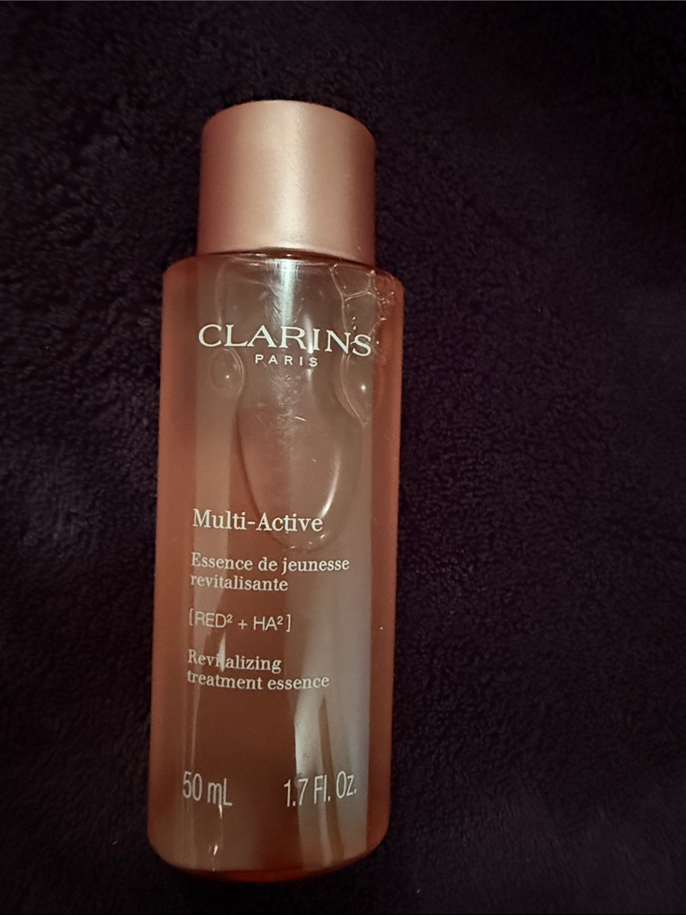 Clarins Multi-Active Revitalizing Treatment Essence - Rose Peach Bottle